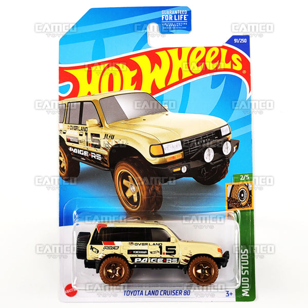 Toyota Land Cruiser 80 #91 tan - Mud Studs - 2022 Hot Wheels Basic Mainline Case Assortment L2593 by Mattel.